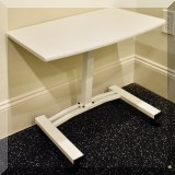 F27. White table. 